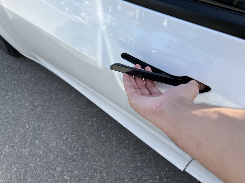 Door Handle Being Pulled on a Tesla Model 3