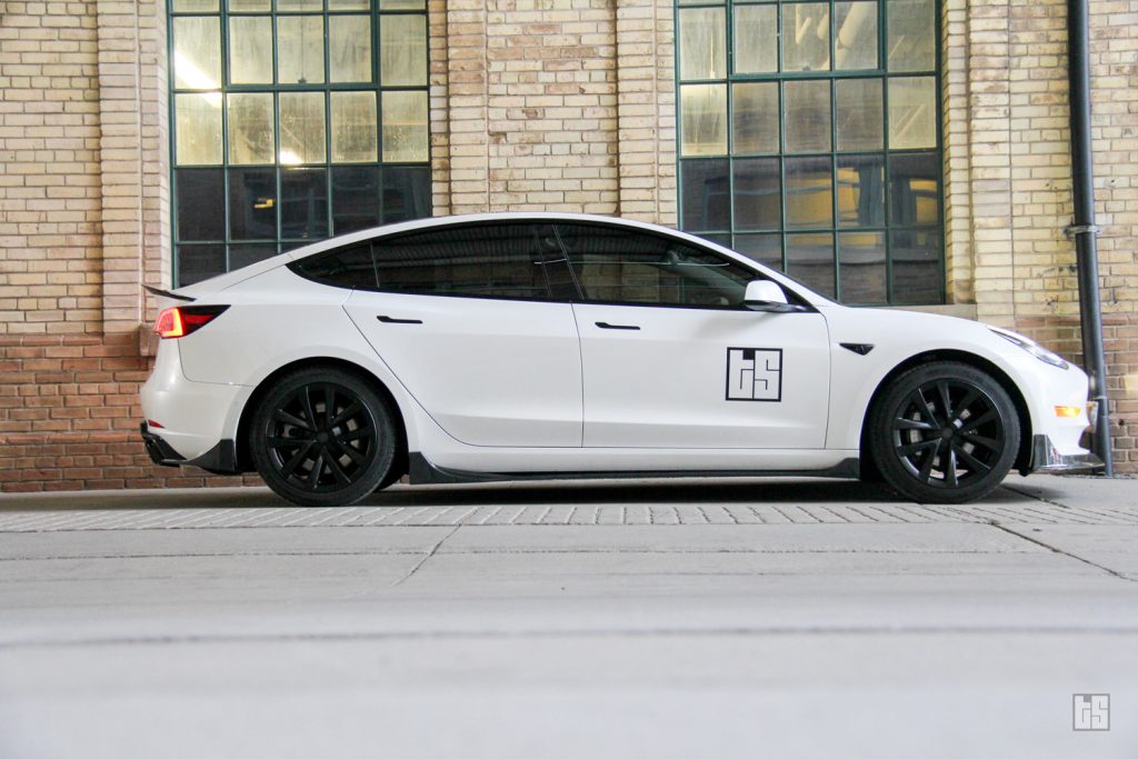 Pearl White Tesla Model 3 with Sport Style Wheel Covers