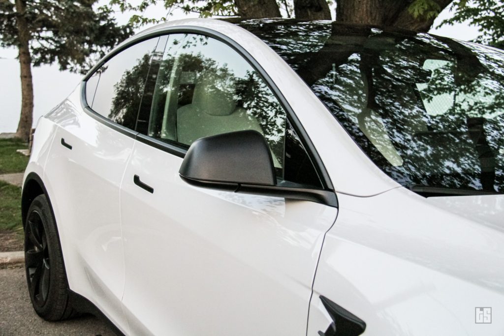 Passenger Side of a Pearl White Tesla Model Y