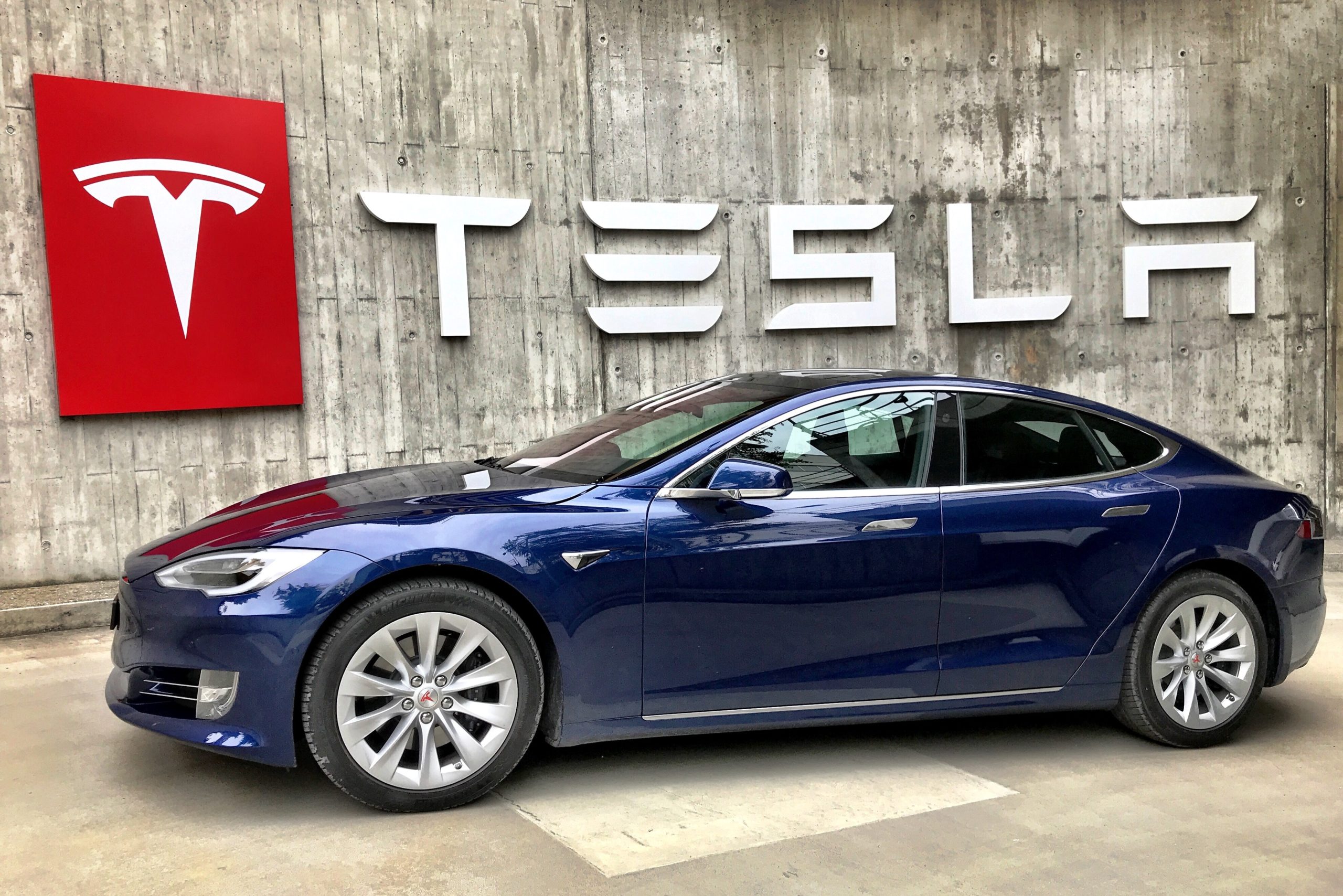 Blue Tesla Model S in a Tesla Showroom